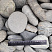 Kamenclub.ru: Галька речная окат (темно-серая) фр. 70-150 мм. купить  в Перми галька речная темно-серая, синяя, серая речная галька округлая  8000 руб/т   фото КАМЕНЬ КЛУБ